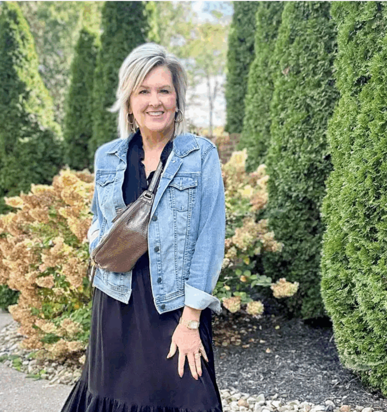 Tania wearing a denim jacket with a chocolate brown belt bag